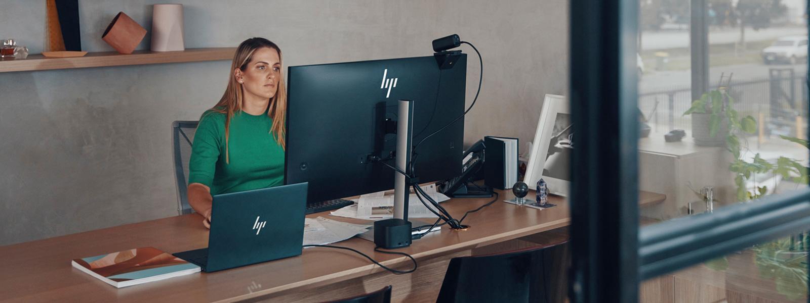 Person working on a desktop workstation