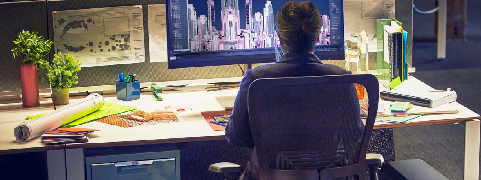 Woman working on a desktop computer