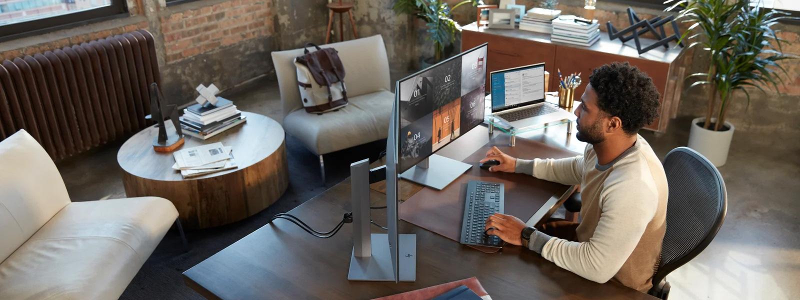 View of a person working in their office