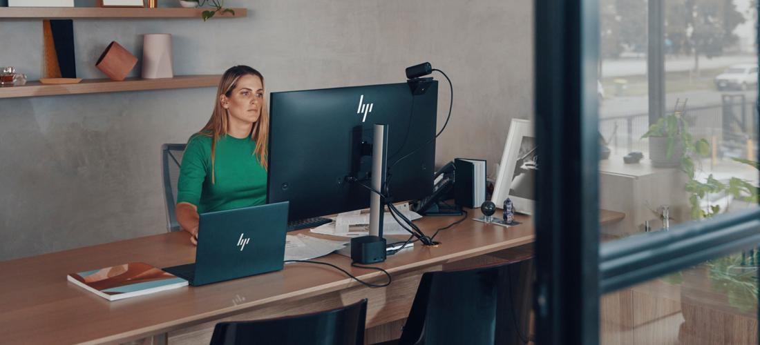 Person working on a desktop workstation