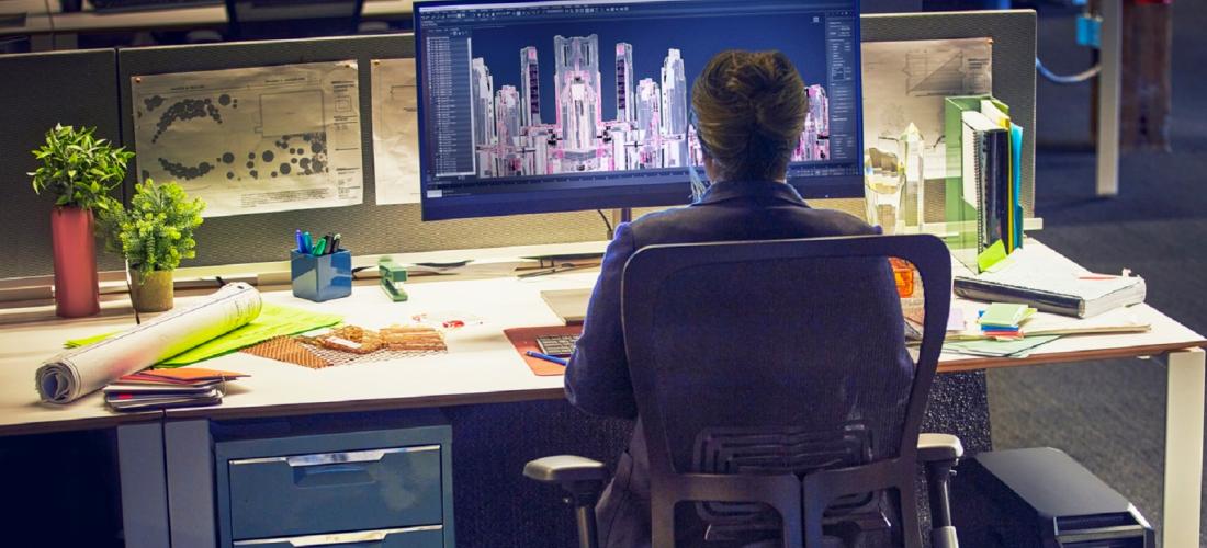 Woman working on a desktop computer